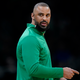Boston Celtics head coach Ime Udoka speaks from the bench during the first half of an NBA basketball game against the Charlotte Hornets, Wednesday, Feb. 2, 2022, in Boston. The Boston Celtics are planning to discipline coach Ime Udoka, likely with a suspension, because of an improper relationship with a member of the organization, two people with knowledge of the matter told The Associated Press on Thursday, Sept. 22, 2022.